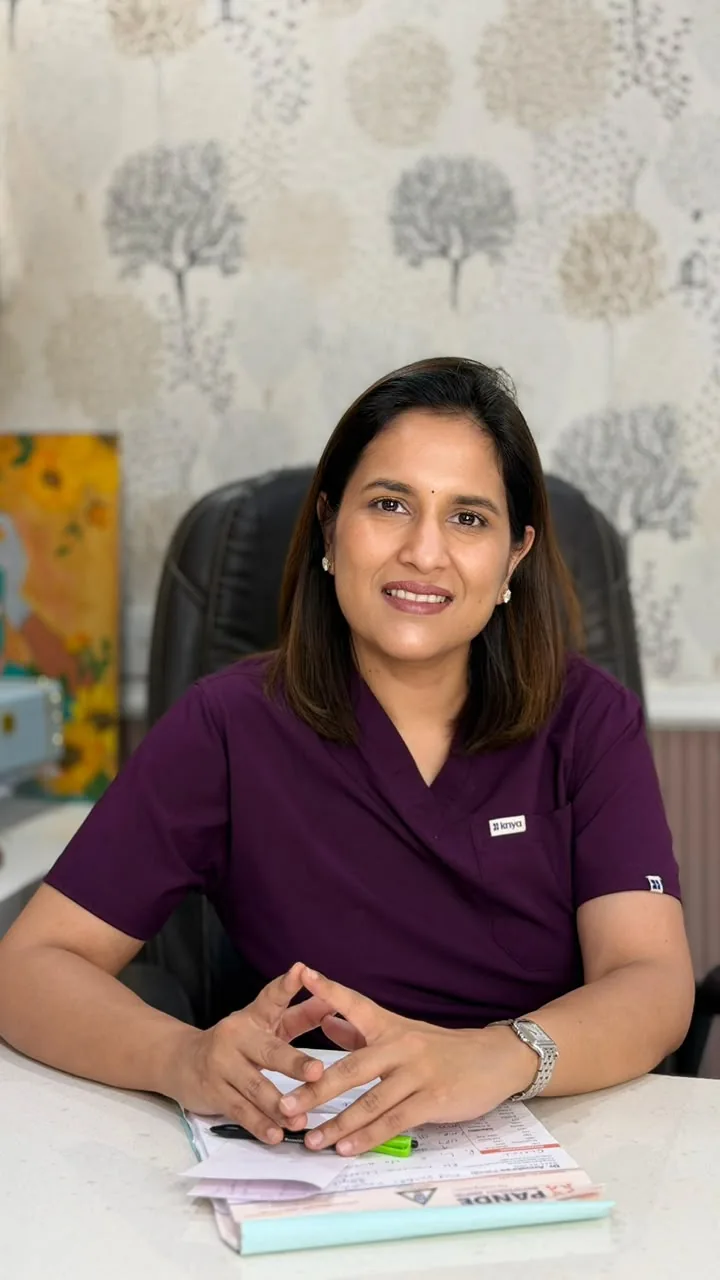 Dr. Anushree Pande seated at her consultation desk