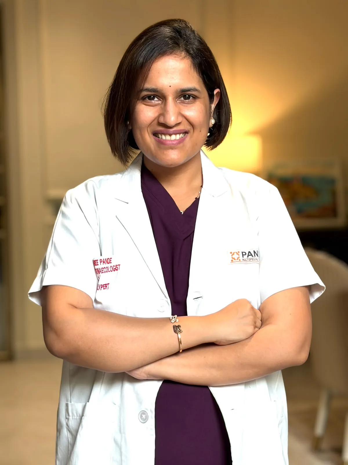 Dr. Anushree Pande in doctor coat